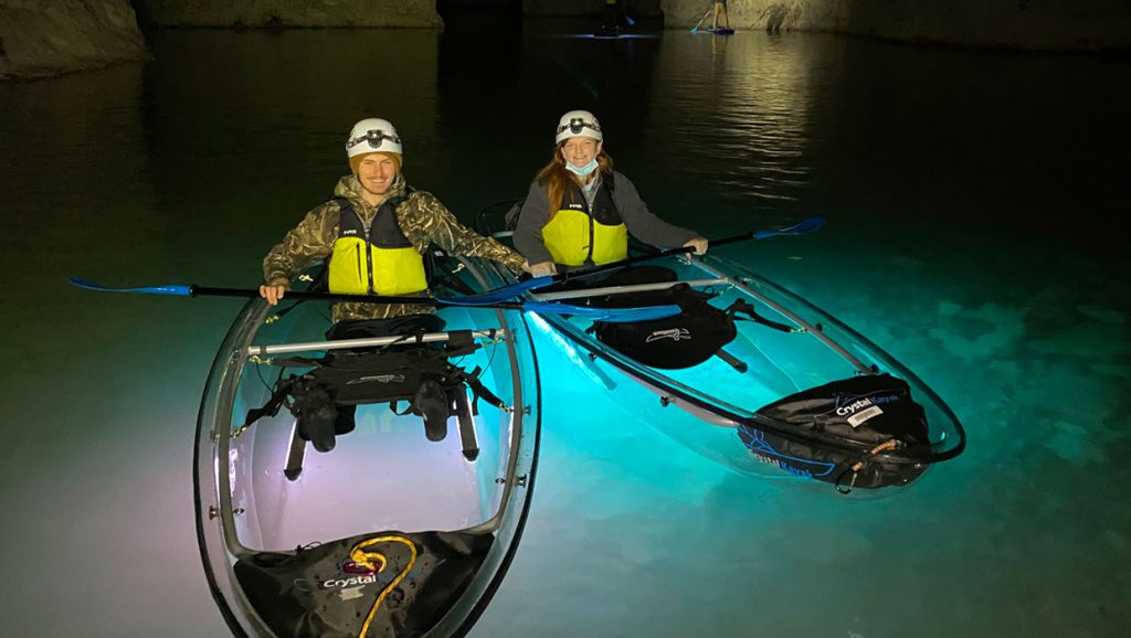 Kayaking In Kentucky Through A Lit Up Mine Looks Unreal