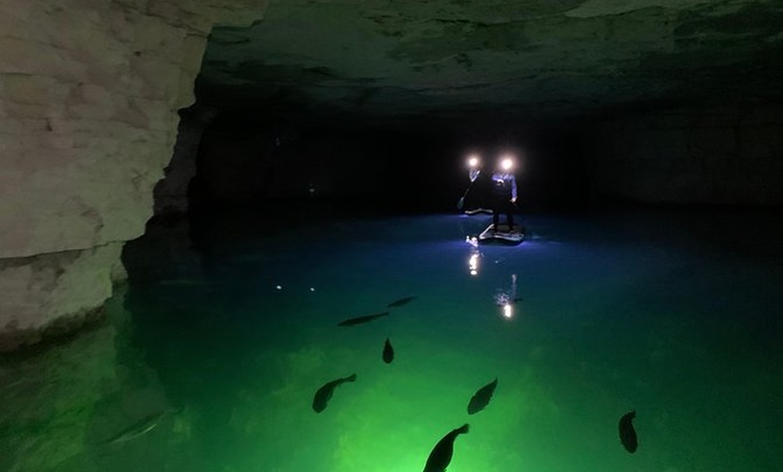 Kayaking In Kentucky Through A Lit Up Mine Looks Unreal