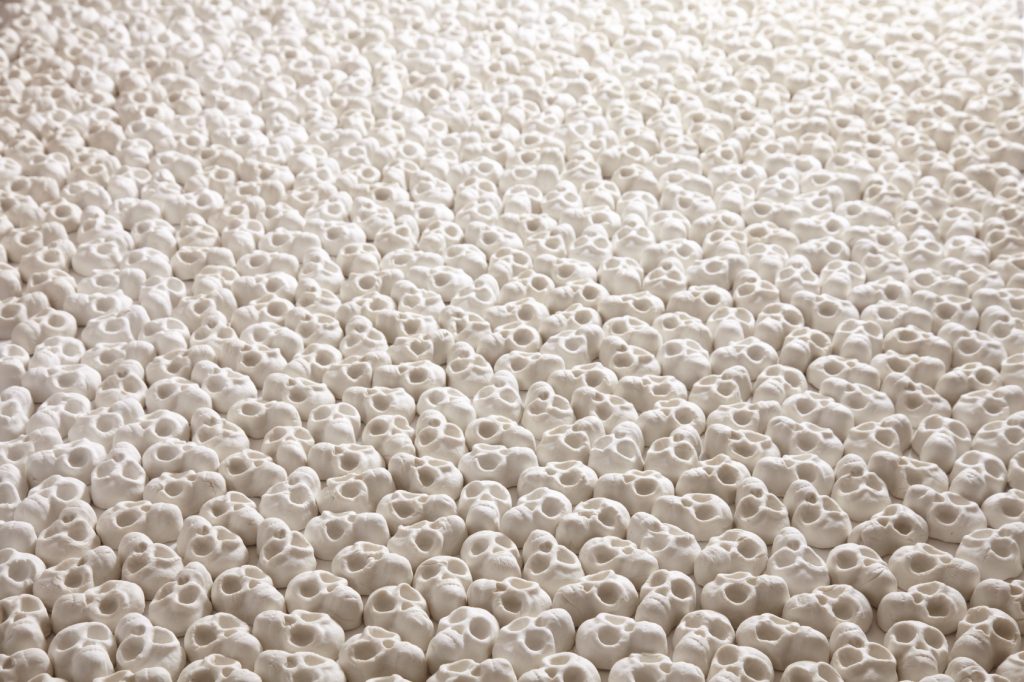 100,000 miniature porcelain skulls make worlds first 'Skull Carpet'